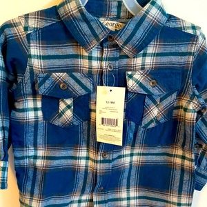 Plaid long sleeve shirt with patch pocket on chest.
